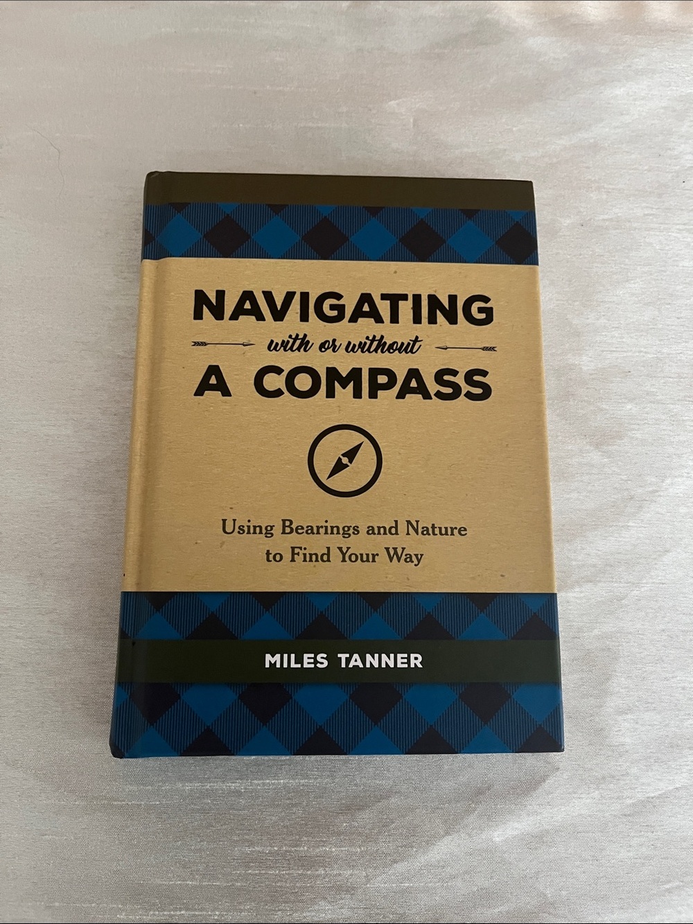 โจ$5 Add-On
Miles Tanner Navigating With or Without a Compass Hardback Book